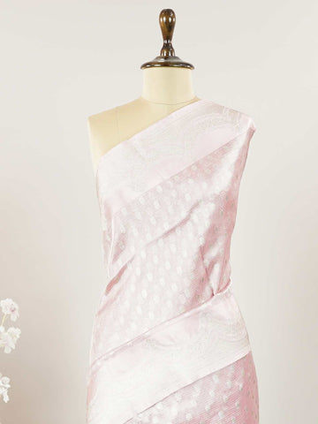 Tissue A Tissue saree is the perfect blend of delicate silk and shimmering zari, woven to create an ethereal, translucent fabric that sparkles with every movement. Lightweight and luxurious, it’s ideal for grand occasions and celebrations where elegance is key. Draped in a Tissue saree, you embody timeless glamour with a modern twist. Abhogi - Banarasi Tissue Kora Saree - Manoranjitham Weaves - Handloom Store