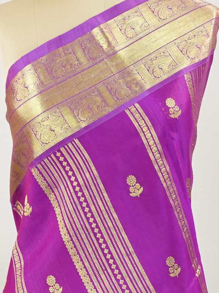 Venkatagiri Silk Woven in the heart of Andhra Pradesh, this Venkatagiri handloom saree is a symbol of regal elegance and heritage. Known for its soft texture and intricate craftsmanship, it drapes gracefully for weddings, pujas, and festive moments. Each thread carries tradition, making it a cherished piece of South Indian artistry. Lightweight yet luxurious — a true sree in every sense. Kavana - Venkatagiri  saree - Manoranjitham Weaves - Handloom Store