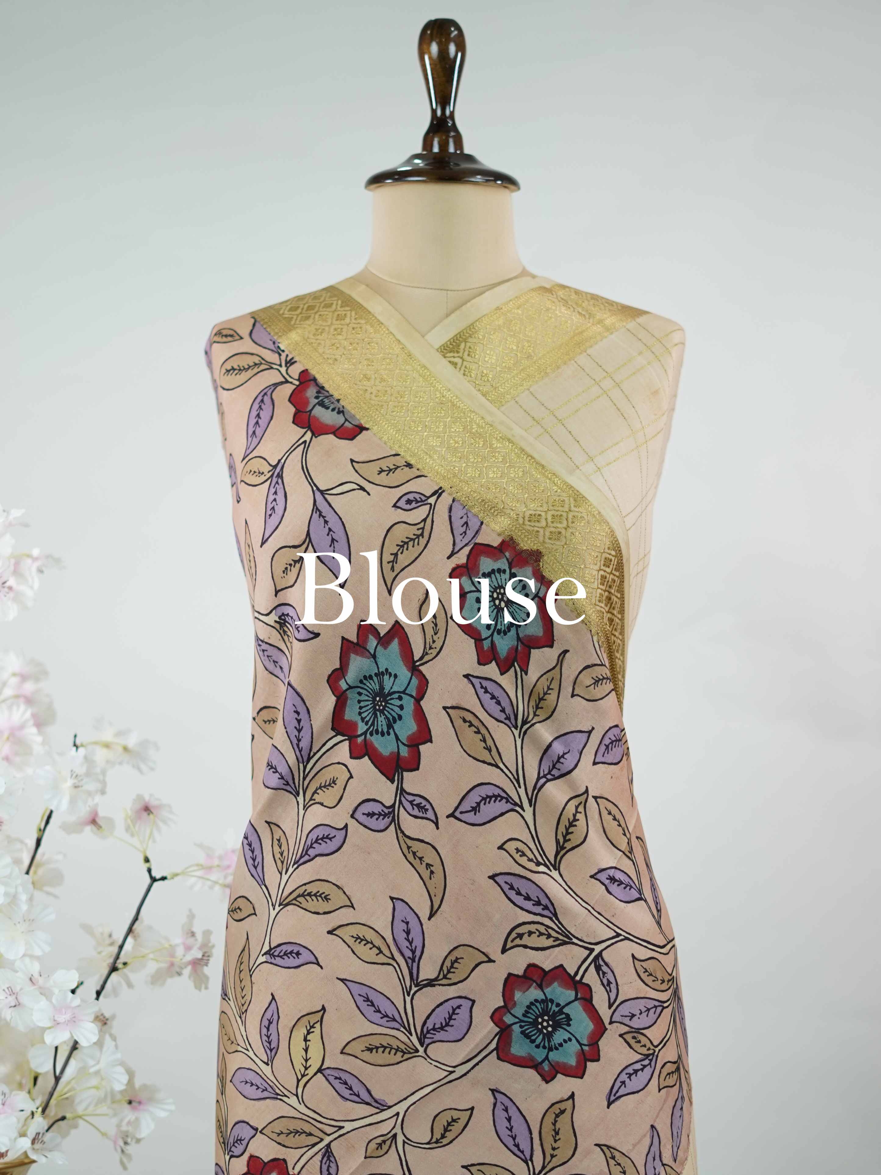 Mysore silk Pure Mysore silk saree featuring classic zari checks paired with intricate hand-drawn pen Kalamkari.br
A striking blend of structured elegance and storytelling artistry, where tradition meets timeless design. Neelapathake - Pure Mysore Silk Saree | Pen Kalamkari - Manoranjitham Weaves - Handloom Store