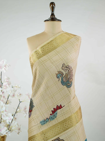 Mysore silk Pure Mysore silk saree featuring classic zari checks paired with intricate hand-drawn pen Kalamkari.br
A striking blend of structured elegance and storytelling artistry, where tradition meets timeless design. Neelapathake - Pure Mysore Silk Saree | Pen Kalamkari - Manoranjitham Weaves - Handloom Store