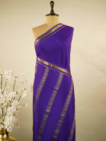 Mysore silk Plain Mysore silk saree accented with delicate small elephant borders.br
A subtle statement of heritage and elegance, woven into timeless simplicity. Kaumari - Pure Mysore Silk Saree | Elephant Border - Manoranjitham Weaves - Handloom Store