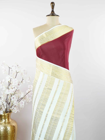 Mysore silk Pure Mysore silk saree woven with timeless elegance. Its smooth texture creates a soft and graceful drape. Crafted by skilled artisans using handloom traditions. Minimal detailing adds refined beauty. A sophisticated saree for every celebration. Nilambari - Pure Mysore Silk Saree - Manoranjitham Weaves - Handloom Store