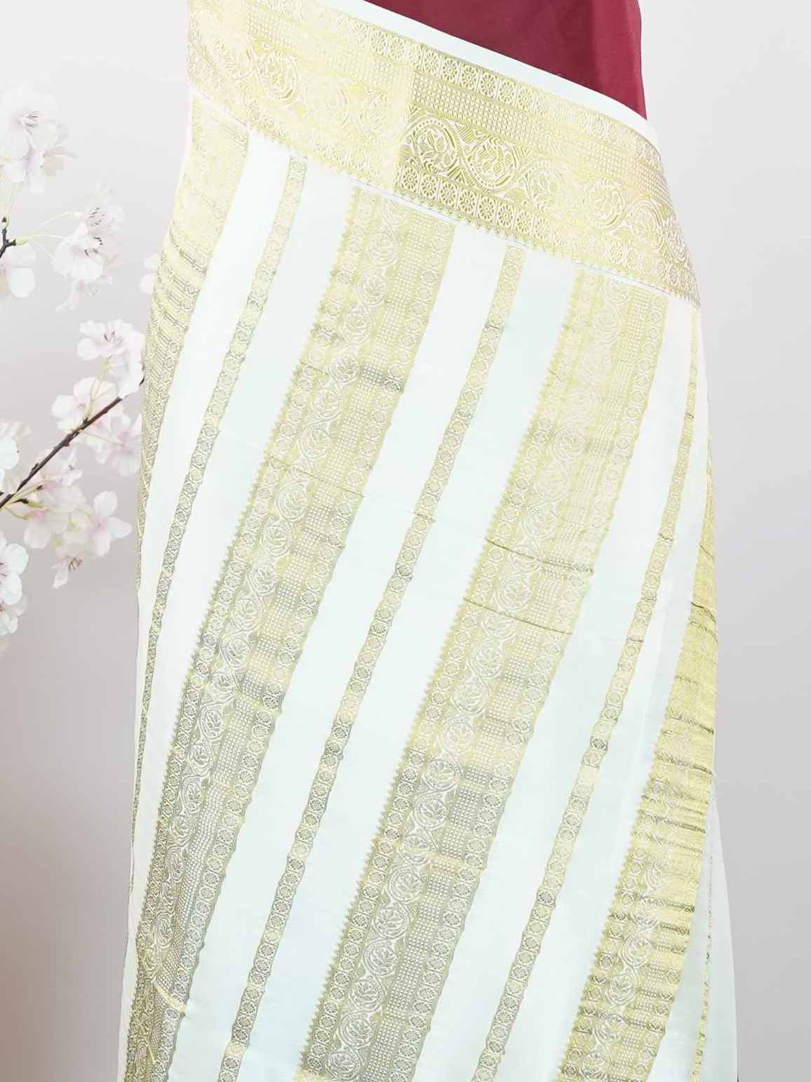 Mysore silk Pure Mysore silk saree woven with timeless elegance. Its smooth texture creates a soft and graceful drape. Crafted by skilled artisans using handloom traditions. Minimal detailing adds refined beauty. A sophisticated saree for every celebration. Nilambari - Pure Mysore Silk Saree - Manoranjitham Weaves - Handloom Store