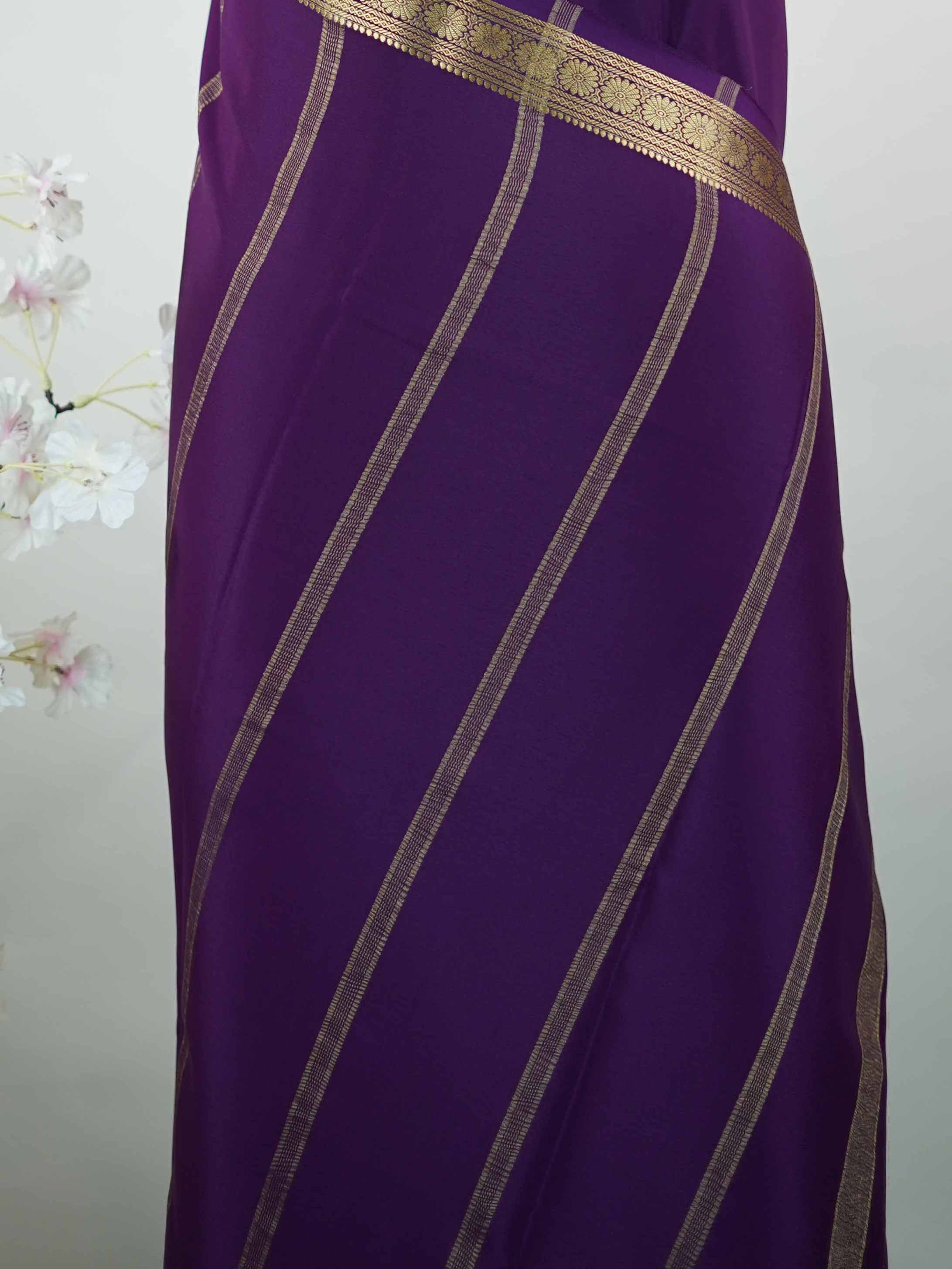 Mysore silk Plain Mysore silk saree accented with delicate small elephant borders.br
A subtle statement of heritage and elegance, woven into timeless simplicity. Trinetra - Pure Mysore Silk Saree | Elephant Border - Manoranjitham Weaves - Handloom Store