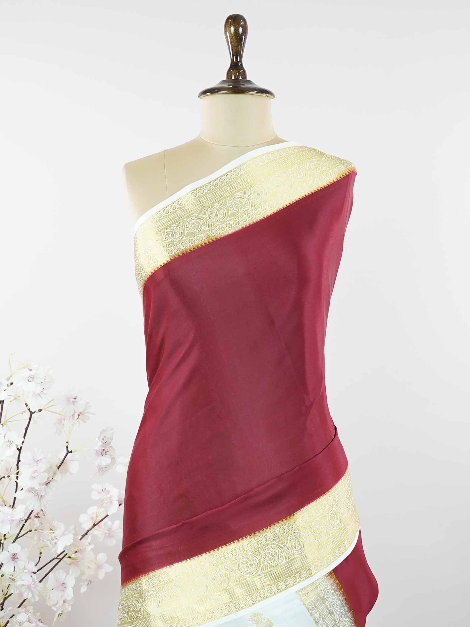 Mysore silk Pure Mysore silk saree woven with timeless elegance. Its smooth texture creates a soft and graceful drape. Crafted by skilled artisans using handloom traditions. Minimal detailing adds refined beauty. A sophisticated saree for every celebration. Nilambari - Pure Mysore Silk Saree - Manoranjitham Weaves - Handloom Store