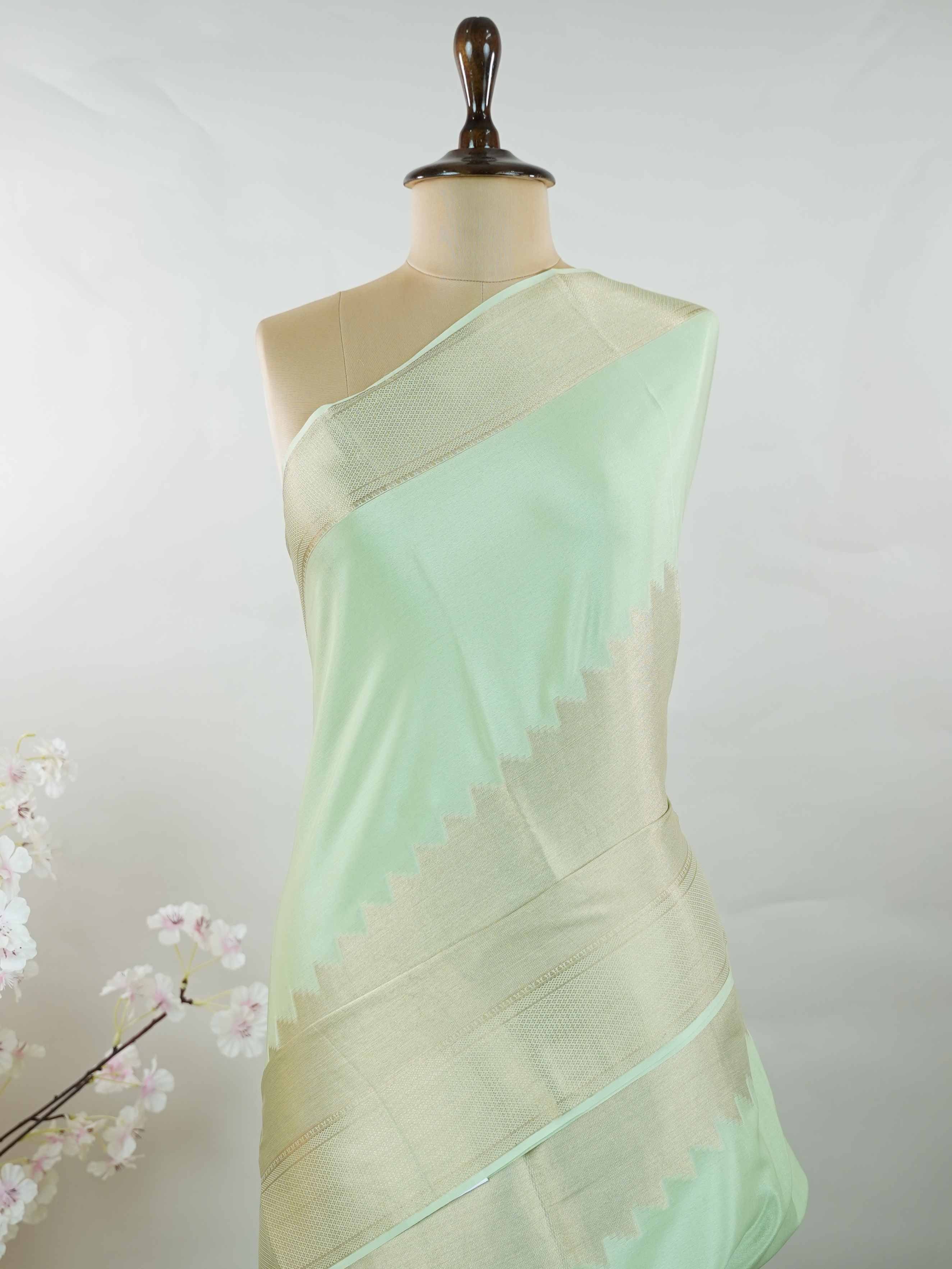 Mysore silk Traditional Mysore silk saree featuring pure handloom artistry. The luxurious texture and subtle sheen stand out beautifully. Simple styling adds a timeless touch. Soft silk comfort for all-day wear. A graceful blend of tradition and elegance. Shrivalli - Pure Mysore Silk Saree - Manoranjitham Weaves - Handloom Store
