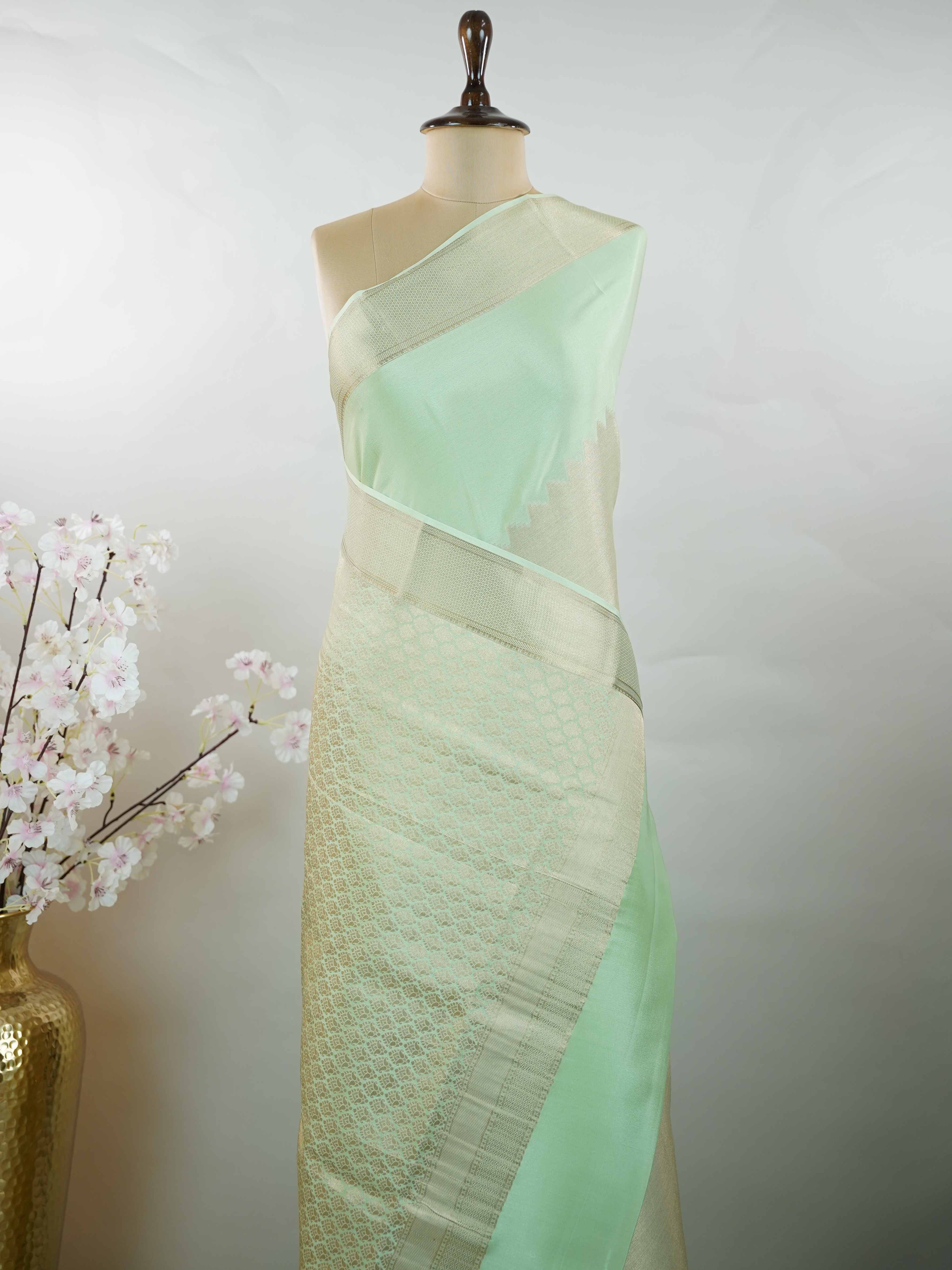 Mysore silk Traditional Mysore silk saree featuring pure handloom artistry. The luxurious texture and subtle sheen stand out beautifully. Simple styling adds a timeless touch. Soft silk comfort for all-day wear. A graceful blend of tradition and elegance. Shrivalli - Pure Mysore Silk Saree - Manoranjitham Weaves - Handloom Store