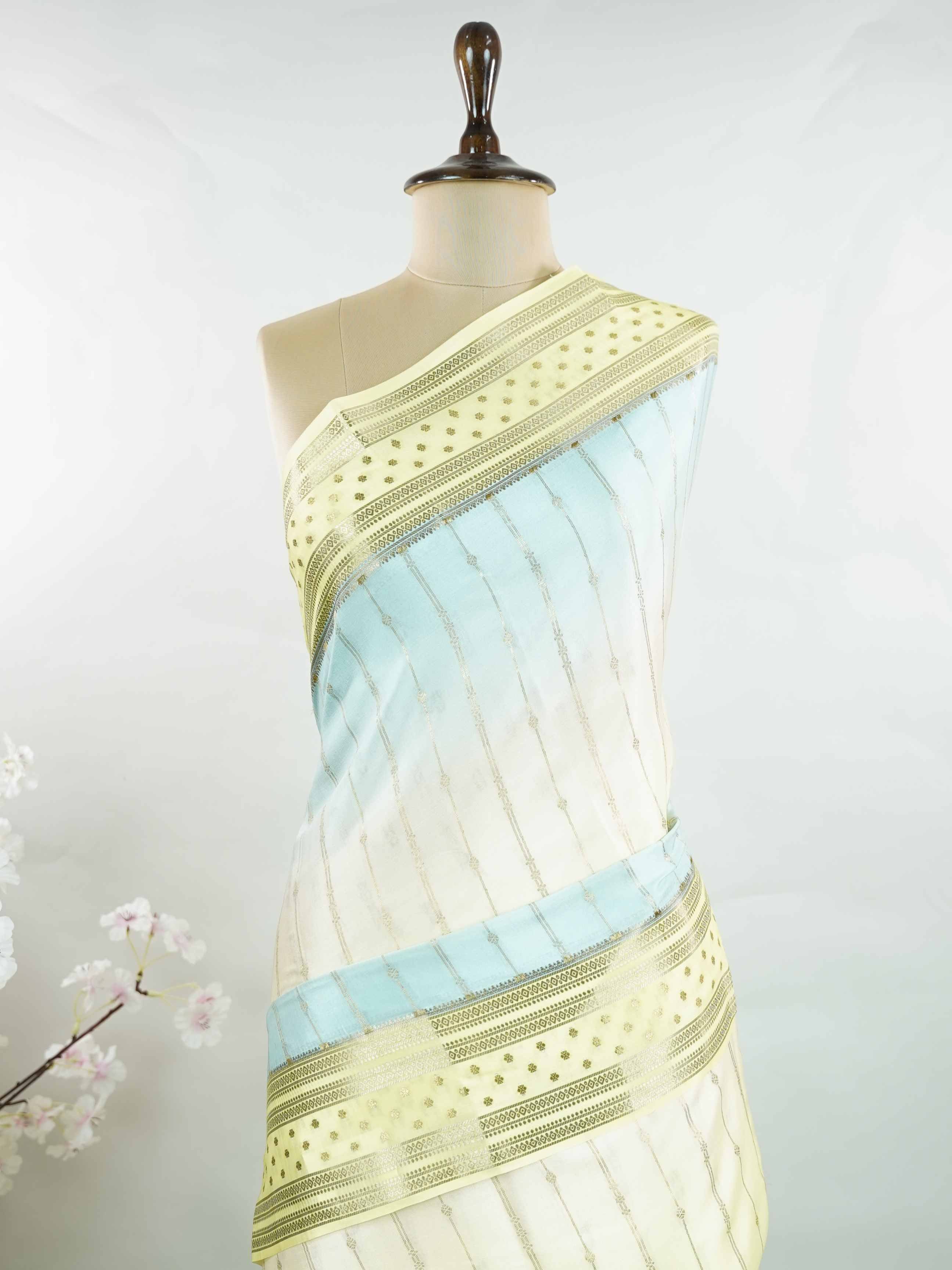 Mysore silk Beautiful Mysore silk saree crafted with pure handloom artistry. The smooth texture creates an elegant and graceful drape. Simple elegance designed for timeless appeal. Comfortable enough for long celebrations. A classic saree that never fades in style. Shodashi - Pure Mysore Silk Saree - Manoranjitham Weaves - Handloom Store
