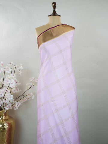 Mysore silk Pure Mysore silk saree featuring understated elegance and charm. Traditional handloom weaving enhances its rich appeal. Soft silk texture offers comfort throughout the day. Simple detailing makes it beautifully versatile. A timeless saree for every wardrobe. Mridulangi - Pure Mysore Silk Saree - Manoranjitham Weaves - Handloom Store