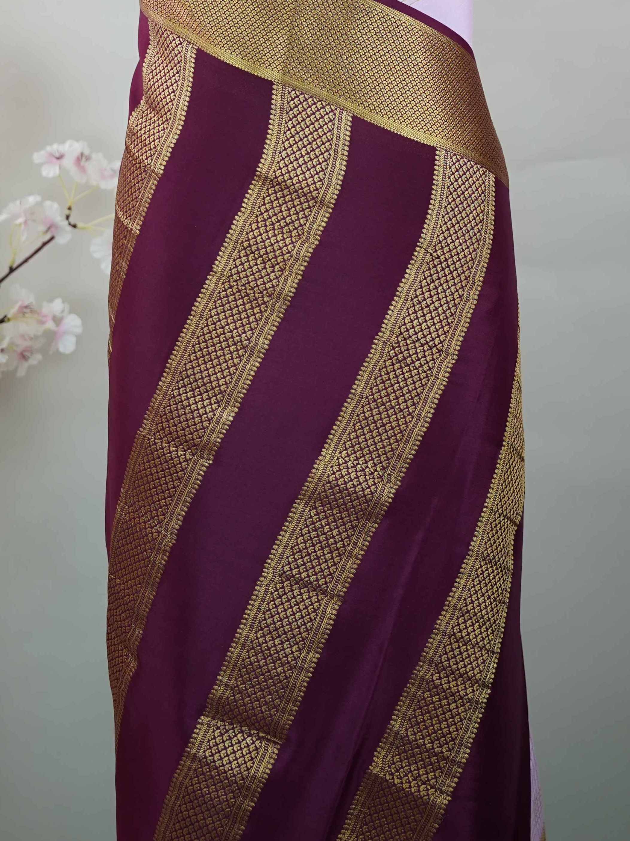 Mysore silk Pure Mysore silk saree featuring understated elegance and charm. Traditional handloom weaving enhances its rich appeal. Soft silk texture offers comfort throughout the day. Simple detailing makes it beautifully versatile. A timeless saree for every wardrobe. Mridulangi - Pure Mysore Silk Saree - Manoranjitham Weaves - Handloom Store