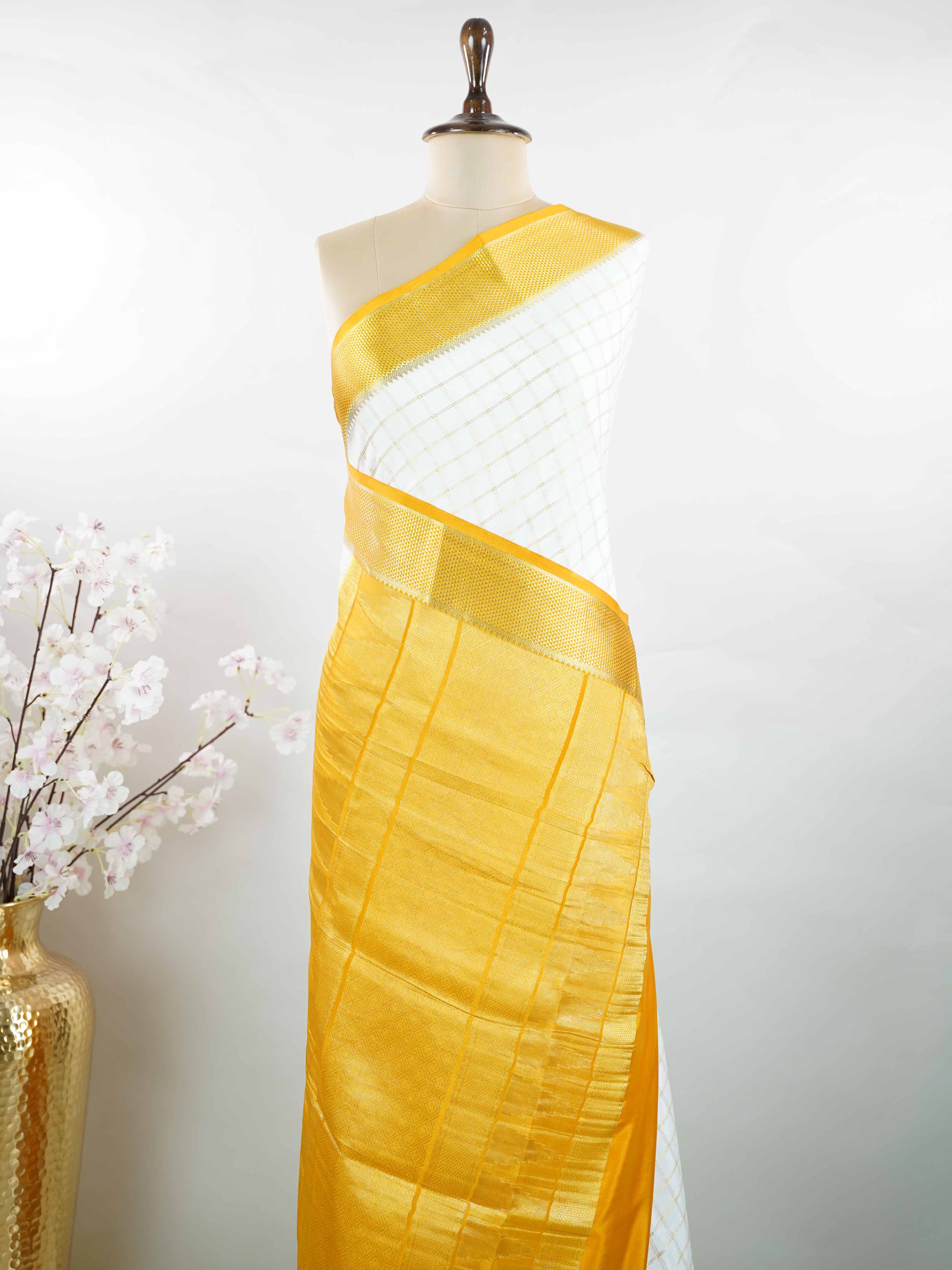 Mysore silk Classic Mysore silk saree designed with pure handloom craftsmanship. Its smooth texture offers effortless grace and comfort. Minimal styling keeps the look elegant and refined. A timeless weave inspired by tradition. Beautifully suited for every occasion. Kalavati - Pure Mysore Silk Saree - Manoranjitham Weaves - Handloom Store