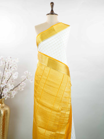 Mysore silk Classic Mysore silk saree designed with pure handloom craftsmanship. Its smooth texture offers effortless grace and comfort. Minimal styling keeps the look elegant and refined. A timeless weave inspired by tradition. Beautifully suited for every occasion. Kalavati - Pure Mysore Silk Saree - Manoranjitham Weaves - Handloom Store