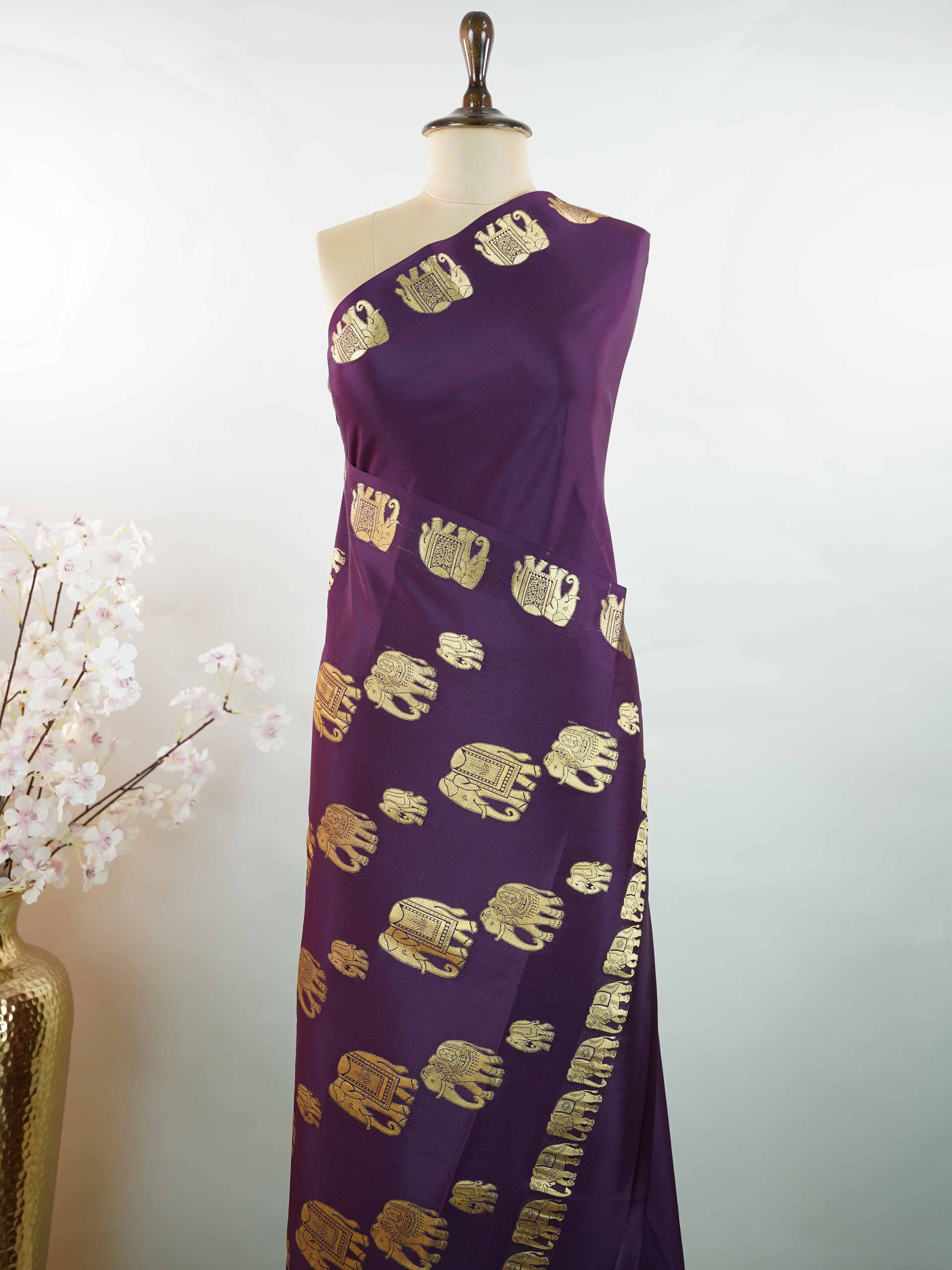 Mysore silk Classic Mysore silk saree woven with traditional craftsmanship. Its elegant texture and fluid drape create a regal look. Simple styling paired with luxurious silk feel. Handloom artistry that reflects timeless beauty. Perfect for festive and cultural occasions. Nilambari - Pure Mysore Silk Saree - Manoranjitham Weaves - Handloom Store
