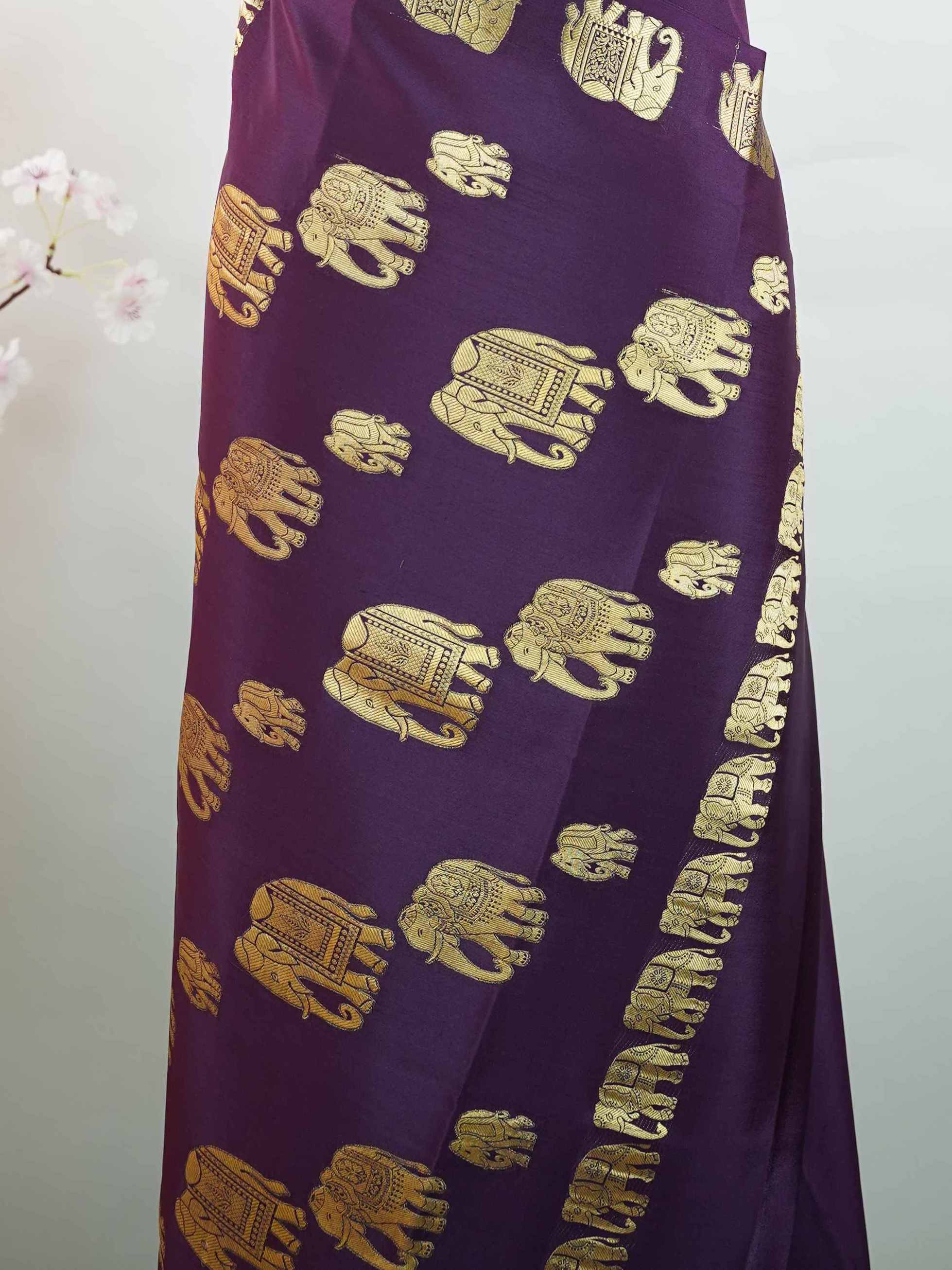 Mysore silk Classic Mysore silk saree woven with traditional craftsmanship. Its elegant texture and fluid drape create a regal look. Simple styling paired with luxurious silk feel. Handloom artistry that reflects timeless beauty. Perfect for festive and cultural occasions. Nilambari - Pure Mysore Silk Saree - Manoranjitham Weaves - Handloom Store