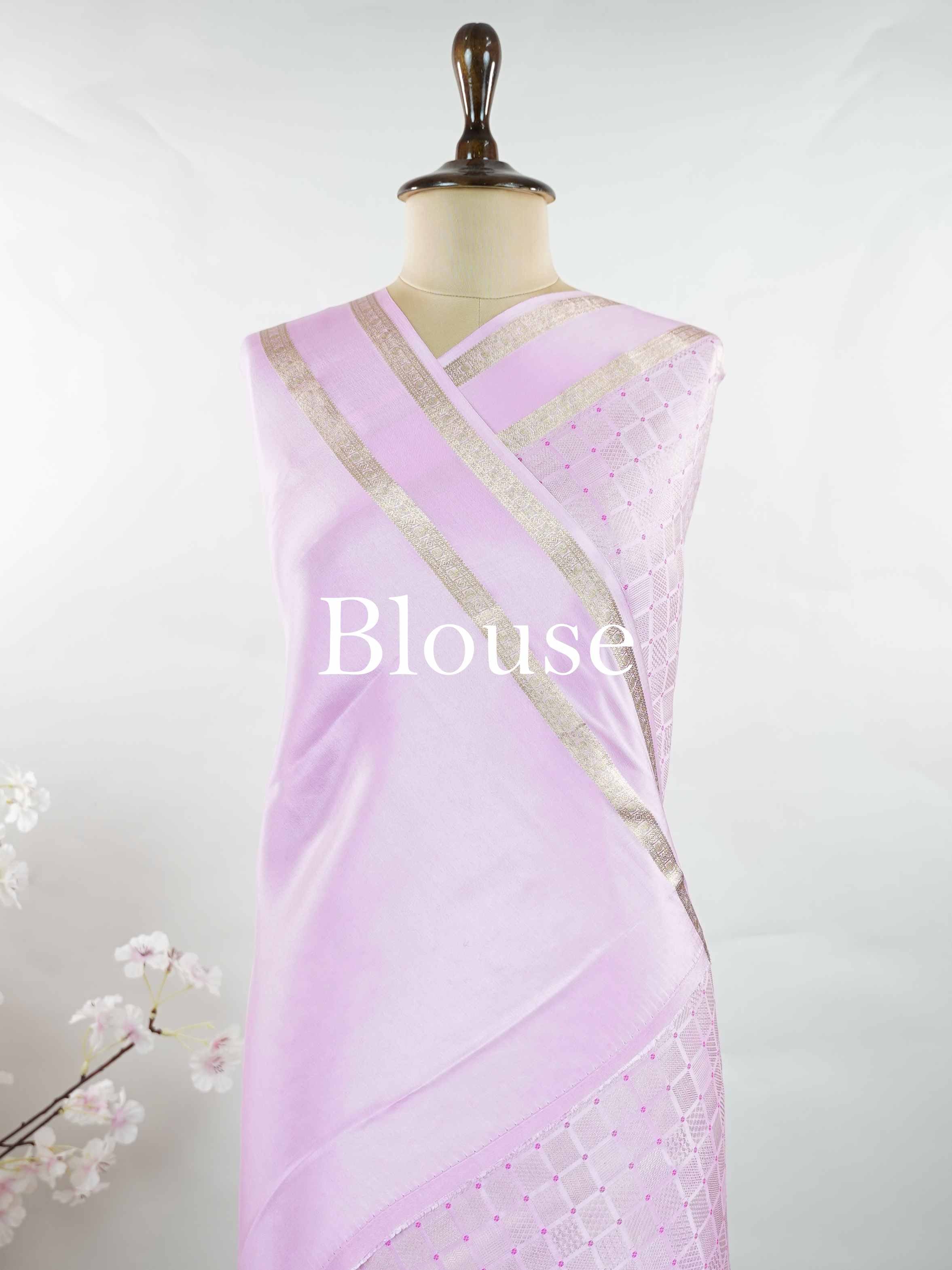 Mysore silk An elegant handloom Mysore silk saree with subtle richness. The graceful weave reflects timeless beauty naturally. Simple styling makes it versatile and refined. Soft texture ensures comfortable draping. A classic saree for every special occasion. Latangi - Pure Mysore Silk Saree - Manoranjitham Weaves - Handloom Store