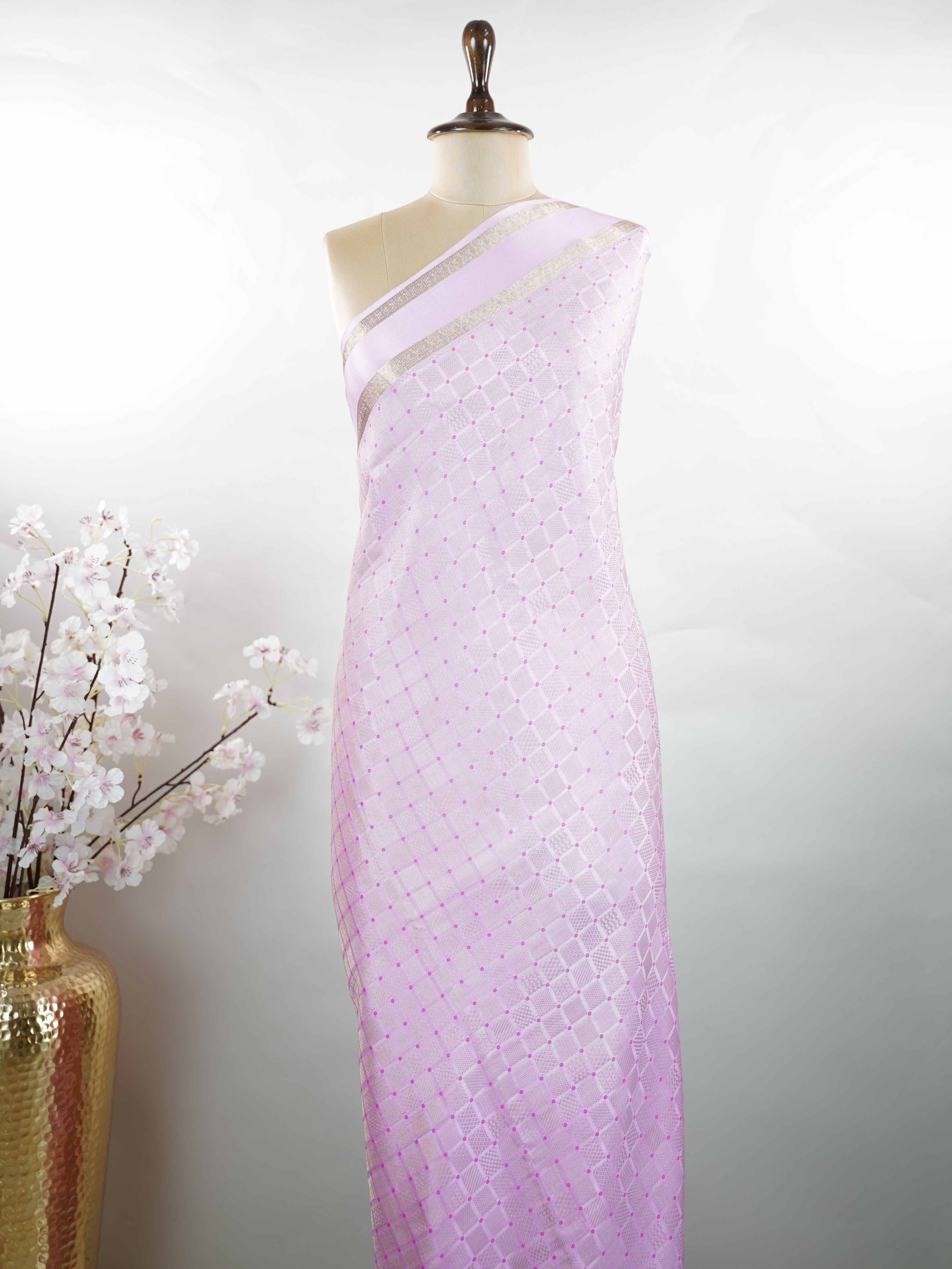 Mysore silk An elegant handloom Mysore silk saree with subtle richness. The graceful weave reflects timeless beauty naturally. Simple styling makes it versatile and refined. Soft texture ensures comfortable draping. A classic saree for every special occasion. Latangi - Pure Mysore Silk Saree - Manoranjitham Weaves - Handloom Store