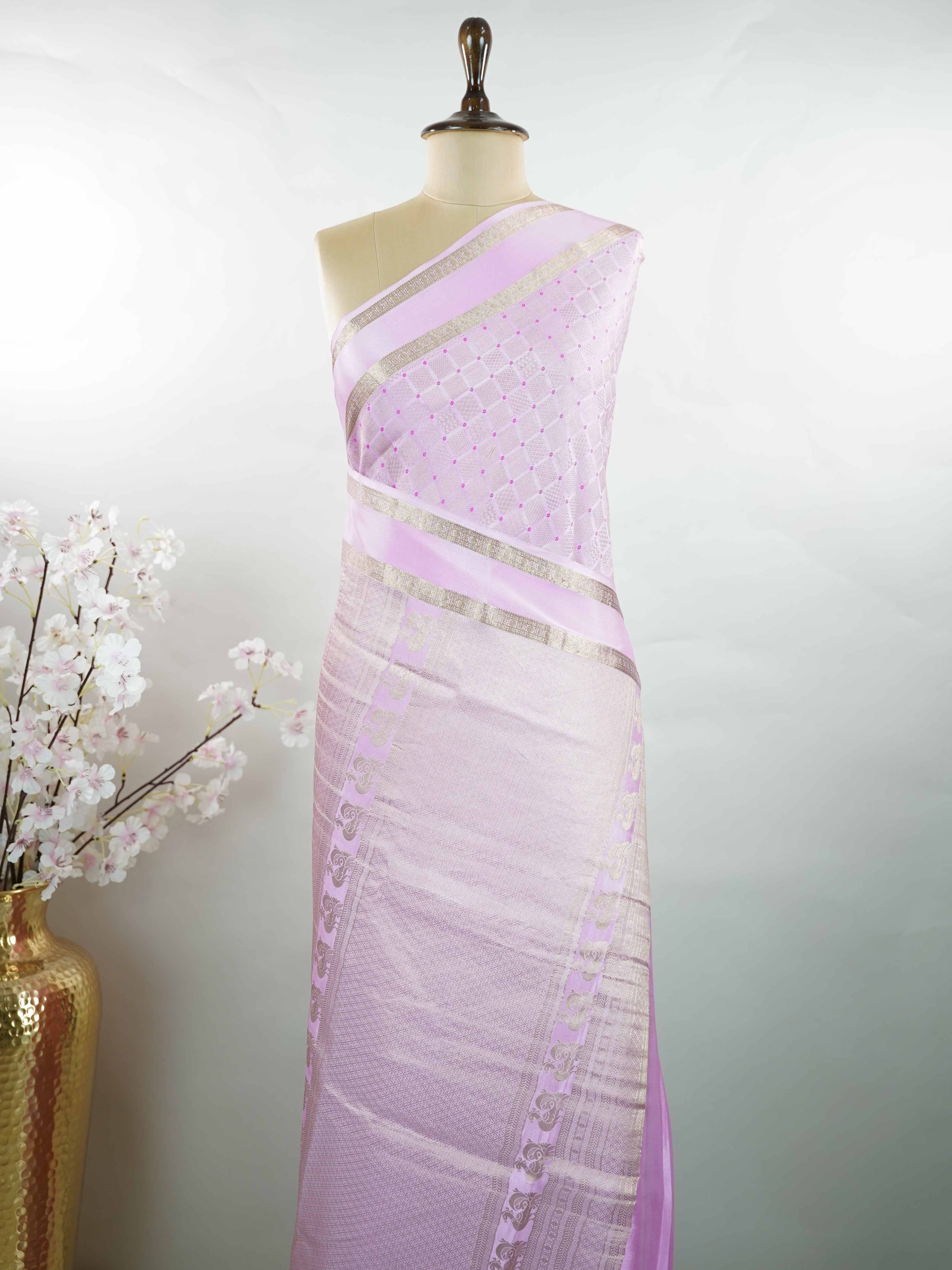 Mysore silk An elegant handloom Mysore silk saree with subtle richness. The graceful weave reflects timeless beauty naturally. Simple styling makes it versatile and refined. Soft texture ensures comfortable draping. A classic saree for every special occasion. Latangi - Pure Mysore Silk Saree - Manoranjitham Weaves - Handloom Store