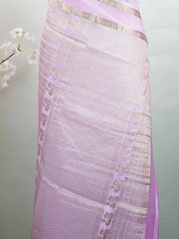 Mysore silk An elegant handloom Mysore silk saree with subtle richness. The graceful weave reflects timeless beauty naturally. Simple styling makes it versatile and refined. Soft texture ensures comfortable draping. A classic saree for every special occasion. Latangi - Pure Mysore Silk Saree - Manoranjitham Weaves - Handloom Store
