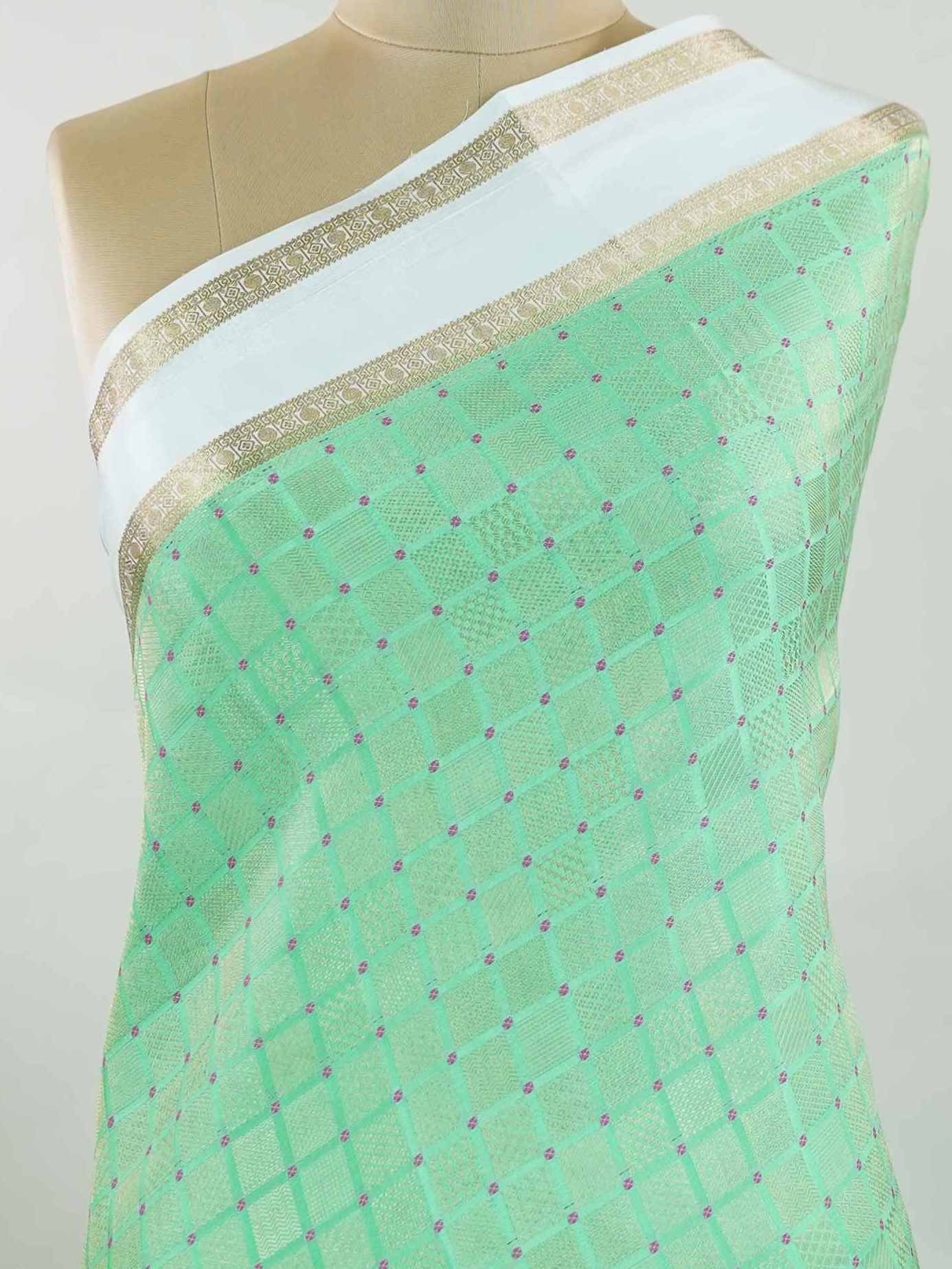 Mysore silk Classic silk saree inspired by traditional Mysore weaving styles. The rich handloom finish adds depth and elegance. Lightweight and easy to carry beautifully. Simple yet luxurious in every way. Perfect for festive and cultural gatherings. Mriduhasini - Pure Mysore Silk Saree - Manoranjitham Weaves - Handloom Store