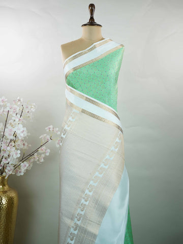 Mysore silk Classic silk saree inspired by traditional Mysore weaving styles. The rich handloom finish adds depth and elegance. Lightweight and easy to carry beautifully. Simple yet luxurious in every way. Perfect for festive and cultural gatherings. Mriduhasini - Pure Mysore Silk Saree - Manoranjitham Weaves - Handloom Store