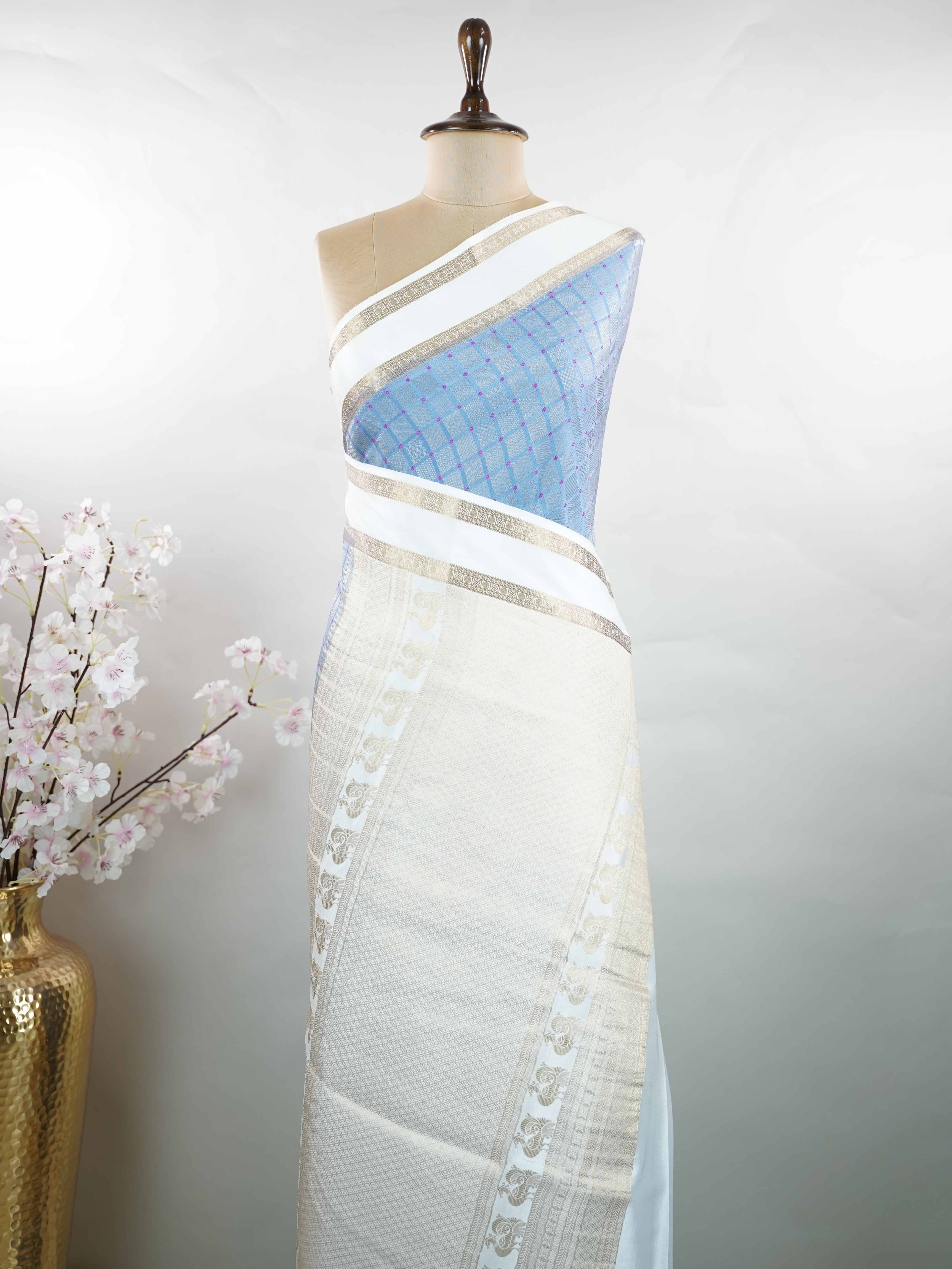 Mysore silk Pure handloom Mysore silk saree with subtle classic charm. The smooth texture gives it a refined luxurious finish. Elegant drape designed for effortless beauty. Traditional craftsmanship in every thread. Perfectly timeless and sophisticated. Charuchandra - Pure Mysore Silk Saree - Manoranjitham Weaves - Handloom Store