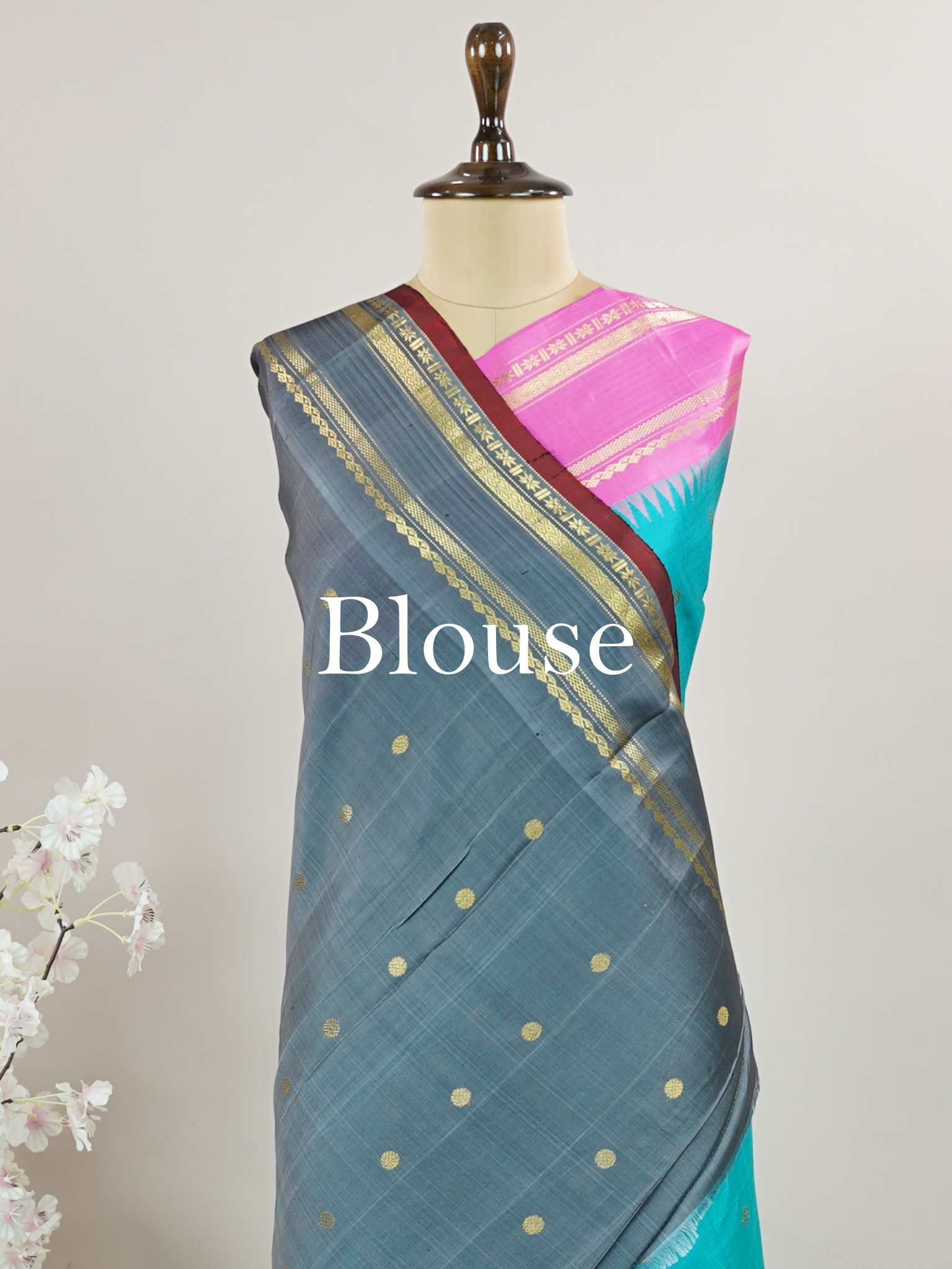 Gadwal Silk This Gadwal silk saree, adorned in Cyan and detailed with Pure Zari weaving, reflects the grandeur of Gadwal. The timeless Buttis motifs enhance its bridal charm. A perfect blend of luxury and tradition, it is designed for those who appreciate fine craftsmanship. Nattakurinji - Handloom Gadwal Silk Saree - Manoranjitham Weaves - Handloom Store