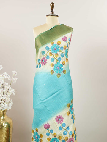 Tussars A Tussar saree with digital print and intricate Aari Peeta embroidery, combining modern design with delicate handcraft. Pahadi - Tussar Silk Saree | Digital Print - Manoranjitham Weaves - Handloom Store
