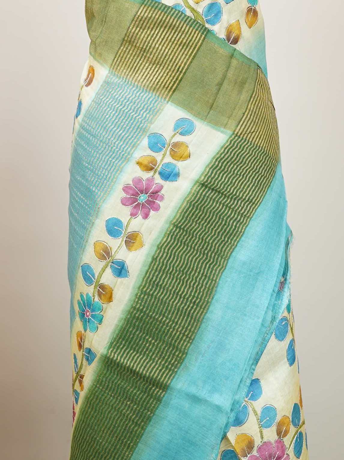 Tussars A Tussar saree with digital print and intricate Aari Peeta embroidery, combining modern design with delicate handcraft. Pahadi - Tussar Silk Saree | Digital Print - Manoranjitham Weaves - Handloom Store