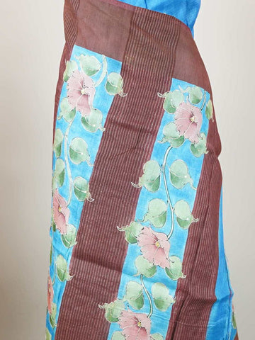 Tussars A Tussar saree with a plain upper body and digital print on the bottom border and pallu, enhanced with Aari Peeta embroidery for a subtle, handcrafted charm. Desha - Tussar Silk Saree | Digital Print - Manoranjitham Weaves - Handloom Store