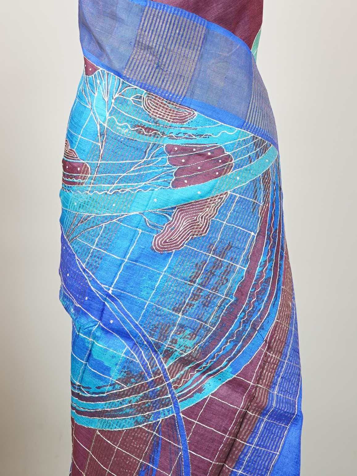 Tussars A Tussar saree with digital print and intricate Aari Peeta work, combining contemporary style with delicate handcraft. Madhukaunsa - Tussar Silk Saree | Digital Print - Manoranjitham Weaves - Handloom Store