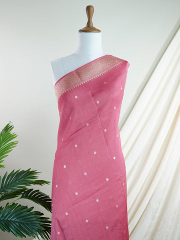 Georgette This exquisite Pink Georgette saree features delicate gold fine zari work accentuating elegant floral motifs throughout. Crafted meticulously on handloom in Varanasi, it measures 6.3 metres, perfect for graceful draping. Gentle care is recommended — hand wash or dry clean only to preserve its delicate beauty and intricate details. Lingasri - Pink Georgette Saree - Manoranjitham Weaves - Handloom Store
