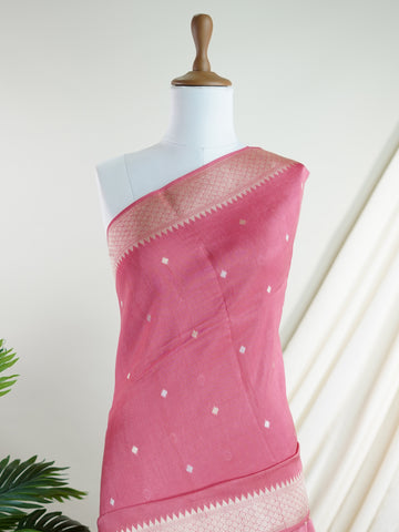 Georgette This exquisite Pink Georgette saree features delicate gold fine zari work accentuating elegant floral motifs throughout. Crafted meticulously on handloom in Varanasi, it measures 6.3 metres, perfect for graceful draping. Gentle care is recommended — hand wash or dry clean only to preserve its delicate beauty and intricate details. Lingasri - Pink Georgette Saree - Manoranjitham Weaves - Handloom Store