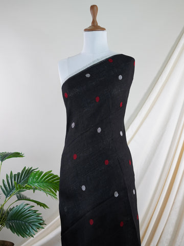 Linen This Linen silk saree, adorned in Black  and detailed with nan weaving, reflects the grandeur of Gujarat. The timeless Handwork motifs enhance its bridal charm. A perfect blend of luxury and tradition, it is designed for those who appreciate fine craftsmanship. Bageshree - Black Handloom Cotton Saree | Zari Border | Traditional - Manoranjitham Weaves - Handloom Store