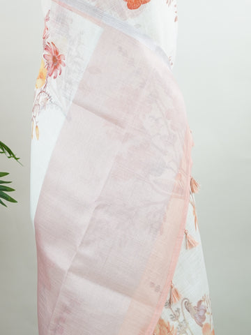 Linen A pristine white base adorned with multicolour floral motifs makes this Silk Kota saree a picture of elegance.br
Fine zari threads glint softly through the weave, adding a touch of celebration.br
Light as air and beautifully translucent, it’s ideal for summer occasions.br
A delicate dance of tradition and colour from Varanasi.br
#SilkKota #FloralElegance #WhiteSareeCharm #FineZariWeave #ManoranjithamSarees Yadukulakambhoji - Multicolour Semi Silk Saree - Manoranjitham Weaves - Handloom Store