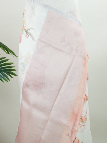 Linen A pristine white base adorned with multicolour floral motifs makes this Silk Kota saree a picture of elegance.br
Fine zari threads glint softly through the weave, adding a touch of celebration.br
Light as air and beautifully translucent, it’s ideal for summer occasions.br
A delicate dance of tradition and colour from Varanasi.br
#SilkKota #FloralElegance #WhiteSareeCharm #FineZariWeave #ManoranjithamSarees Adana - Multicolour Semi Silk Saree - Manoranjitham Weaves - Handloom Store