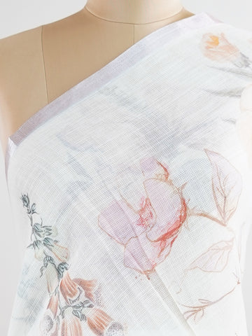 Linen A pristine white base adorned with multicolour floral motifs makes this Silk Kota saree a picture of elegance.br
Fine zari threads glint softly through the weave, adding a touch of celebration.br
Light as air and beautifully translucent, it’s ideal for summer occasions.br
A delicate dance of tradition and colour from Varanasi.br
#SilkKota #FloralElegance #WhiteSareeCharm #FineZariWeave #ManoranjithamSarees Ahiri - Multicolour Semi Silk Saree - Manoranjitham Weaves - Handloom Store