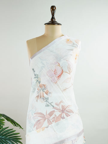 Linen A pristine white base adorned with multicolour floral motifs makes this Silk Kota saree a picture of elegance.br
Fine zari threads glint softly through the weave, adding a touch of celebration.br
Light as air and beautifully translucent, it’s ideal for summer occasions.br
A delicate dance of tradition and colour from Varanasi.br
#SilkKota #FloralElegance #WhiteSareeCharm #FineZariWeave #ManoranjithamSarees Ahiri - Multicolour Semi Silk Saree - Manoranjitham Weaves - Handloom Store