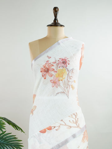 Linen A pristine white base adorned with multicolour floral motifs makes this Silk Kota saree a picture of elegance.br
Fine zari threads glint softly through the weave, adding a touch of celebration.br
Light as air and beautifully translucent, it’s ideal for summer occasions.br
A delicate dance of tradition and colour from Varanasi.br
#SilkKota #FloralElegance #WhiteSareeCharm #FineZariWeave #ManoranjithamSarees Amrutavarshini - Multicolour Semi Silk Saree - Manoranjitham Weaves - Handloom Store