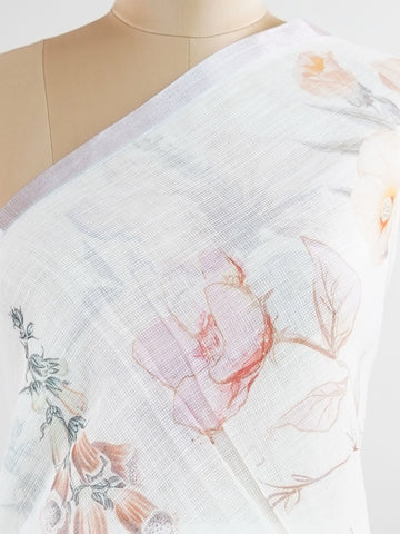 Linen A pristine white base adorned with multicolour floral motifs makes this Silk Kota saree a picture of elegance.br
Fine zari threads glint softly through the weave, adding a touch of celebration.br
Light as air and beautifully translucent, it’s ideal for summer occasions.br
A delicate dance of tradition and colour from Varanasi.br
#SilkKota #FloralElegance #WhiteSareeCharm #FineZariWeave #ManoranjithamSarees Andolika - Multicolour Semi Silk Saree - Manoranjitham Weaves - Handloom Store