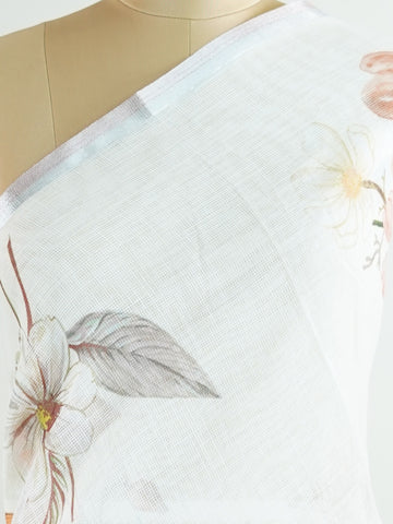 Linen A pristine white base adorned with multicolour floral motifs makes this Silk Kota saree a picture of elegance.br
Fine zari threads glint softly through the weave, adding a touch of celebration.br
Light as air and beautifully translucent, it’s ideal for summer occasions.br
A delicate dance of tradition and colour from Varanasi.br
#SilkKota #FloralElegance #WhiteSareeCharm #FineZariWeave #ManoranjithamSarees Arunachala - Multicolour Semi Silk Saree - Manoranjitham Weaves - Handloom Store