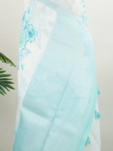 Linen A pristine white base adorned with multicolour floral motifs makes this Silk Kota saree a picture of elegance.br
Fine zari threads glint softly through the weave, adding a touch of celebration.br
Light as air and beautifully translucent, it’s ideal for summer occasions.br
A delicate dance of tradition and colour from Varanasi.br
#SilkKota #FloralElegance #WhiteSareeCharm #FineZariWeave #ManoranjithamSarees Atana - Multicolour Semi Silk Saree - Manoranjitham Weaves - Handloom Store