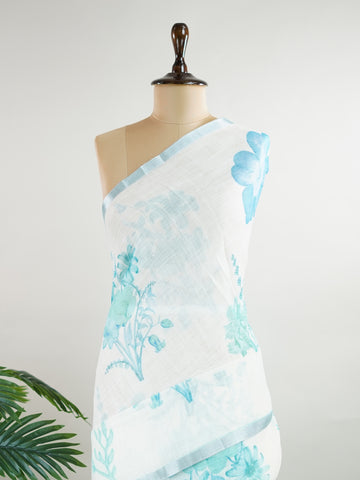 Linen A pristine white base adorned with multicolour floral motifs makes this Silk Kota saree a picture of elegance.
Fine zari threads glint softly through the weave, adding a touch of celebration.
Light as air and beautifully translucent, it’s ideal for summer occasions.
A delicate dance of tradition and colour from Varanasi.
#SilkKota #FloralElegance #WhiteSareeCharm #FineZariWeave #ManoranjithamSarees







 Avantika - Manoranjitham Weaves - Handloom Store