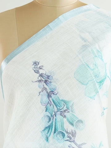 Linen A pristine white base adorned with multicolour floral motifs makes this Silk Kota saree a picture of elegance.
Fine zari threads glint softly through the weave, adding a touch of celebration.
Light as air and beautifully translucent, it’s ideal for summer occasions.
A delicate dance of tradition and colour from Varanasi.
#SilkKota #FloralElegance #WhiteSareeCharm #FineZariWeave #ManoranjithamSarees







 Bahudari - Manoranjitham Weaves - Handloom Store
