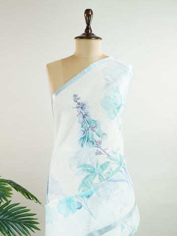 Linen A pristine white base adorned with multicolour floral motifs makes this Silk Kota saree a picture of elegance.
Fine zari threads glint softly through the weave, adding a touch of celebration.
Light as air and beautifully translucent, it’s ideal for summer occasions.
A delicate dance of tradition and colour from Varanasi.
#SilkKota #FloralElegance #WhiteSareeCharm #FineZariWeave #ManoranjithamSarees







 Bahudari - Manoranjitham Weaves - Handloom Store