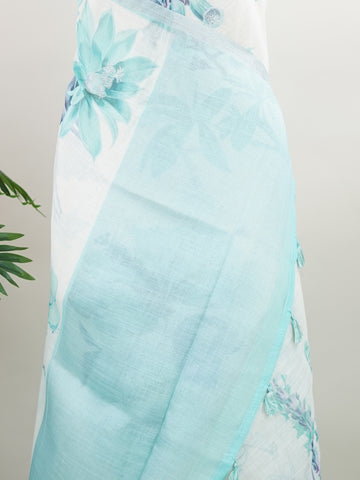 Linen A pristine white base adorned with multicolour floral motifs makes this Silk Kota saree a picture of elegance.br
Fine zari threads glint softly through the weave, adding a touch of celebration.br
Light as air and beautifully translucent, it’s ideal for summer occasions.br
A delicate dance of tradition and colour from Varanasi.br
#SilkKota #FloralElegance #WhiteSareeCharm #FineZariWeave #ManoranjithamSarees Bindumalini - Multicolour Semi Silk Saree - Manoranjitham Weaves - Handloom Store