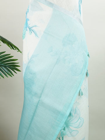 Linen A pristine white base adorned with multicolour floral motifs makes this Silk Kota saree a picture of elegance.br
Fine zari threads glint softly through the weave, adding a touch of celebration.br
Light as air and beautifully translucent, it’s ideal for summer occasions.br
A delicate dance of tradition and colour from Varanasi.br
#SilkKota #FloralElegance #WhiteSareeCharm #FineZariWeave #ManoranjithamSarees Bilahari - Multicolour Semi Silk Saree - Manoranjitham Weaves - Handloom Store