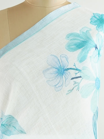 Linen A pristine white base adorned with multicolour floral motifs makes this Silk Kota saree a picture of elegance.br
Fine zari threads glint softly through the weave, adding a touch of celebration.br
Light as air and beautifully translucent, it’s ideal for summer occasions.br
A delicate dance of tradition and colour from Varanasi.br
#SilkKota #FloralElegance #WhiteSareeCharm #FineZariWeave #ManoranjithamSarees Bilahari - Multicolour Semi Silk Saree - Manoranjitham Weaves - Handloom Store