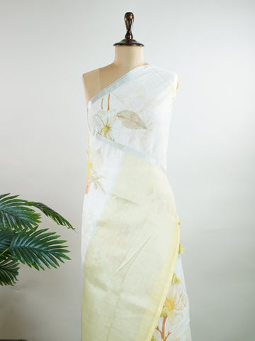 Linen A pristine white base adorned with multicolour floral motifs makes this Silk Kota saree a picture of elegance.br
Fine zari threads glint softly through the weave, adding a touch of celebration.br
Light as air and beautifully translucent, it’s ideal for summer occasions.br
A delicate dance of tradition and colour from Varanasi.br
#SilkKota #FloralElegance #WhiteSareeCharm #FineZariWeave #ManoranjithamSarees Brihadishvari - Multicolour Semi Silk Saree - Manoranjitham Weaves - Handloom Store