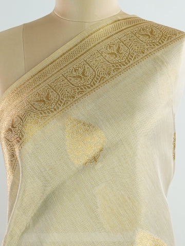 tissue This Kora Semi Tissue saree in rich gold features elegant stripes woven with fine zari. Lightweight and luminous, it captures the essence of festive finesse. Crafted in Varanasi, it drapes with ease and radiance. A timeless choice for celebrations with subtle grandeur. #KoraSemiTissue #GoldStripes #FineZari #VaranasiWeaves #ManoranjithamSarees Supriya - Gold Semi Silk Saree - Manoranjitham Weaves - Handloom Store