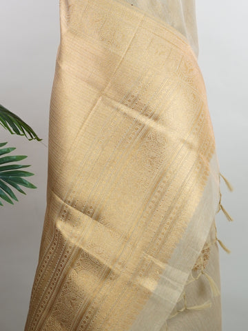 tissue This Kora Semi Tissue saree in rich gold features elegant stripes woven with fine zari. Lightweight and luminous, it captures the essence of festive finesse. Crafted in Varanasi, it drapes with ease and radiance. A timeless choice for celebrations with subtle grandeur. #KoraSemiTissue #GoldStripes #FineZari #VaranasiWeaves #ManoranjithamSarees Supriya - Gold Semi Silk Saree - Manoranjitham Weaves - Handloom Store